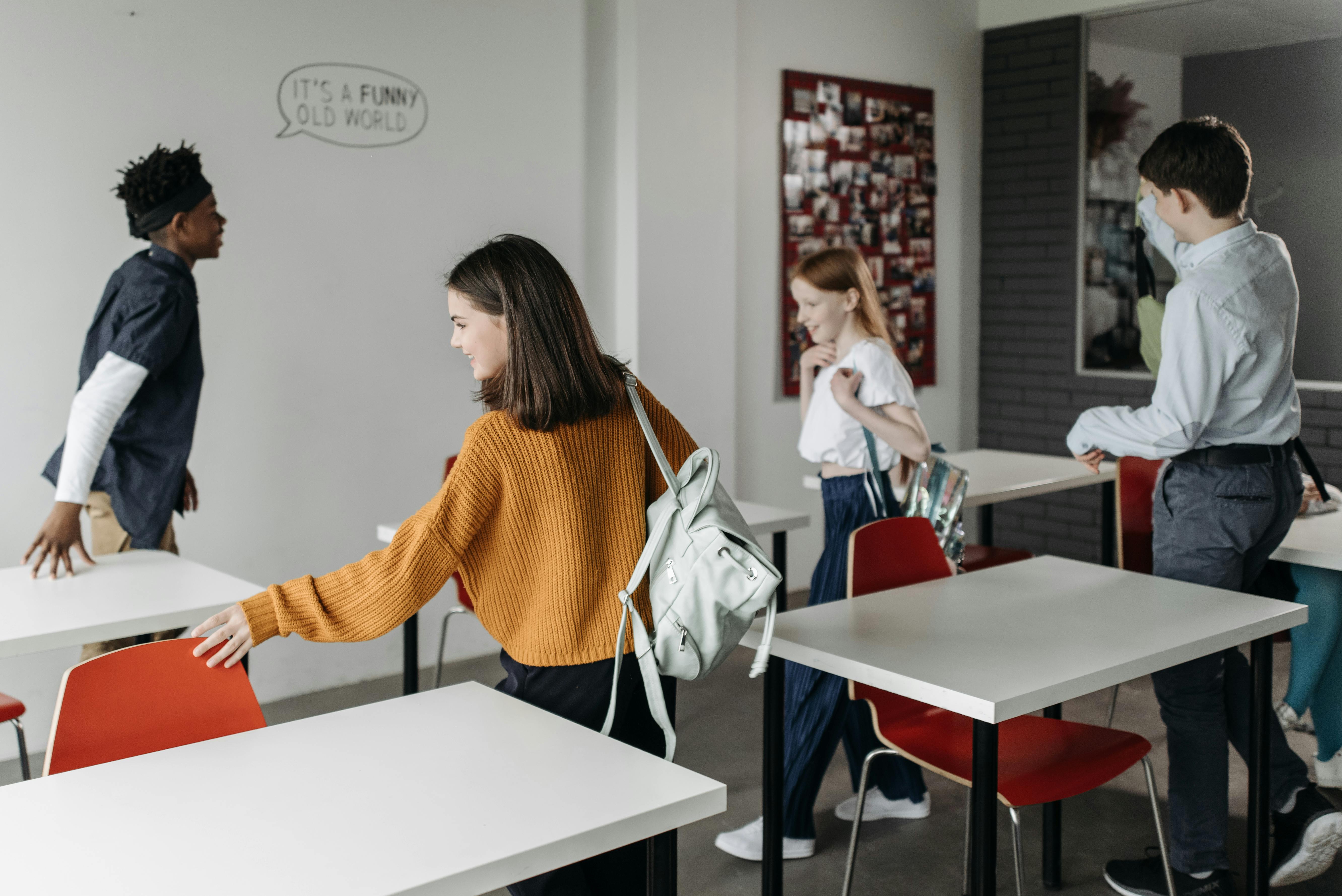 Happy students in a bright classroom